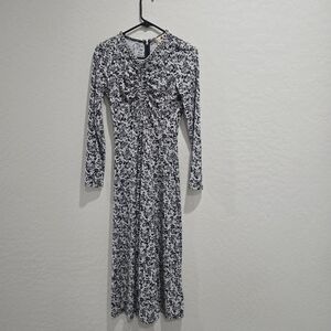 Michael Kors gray,white and black print, silver chain neck long sleeve dress